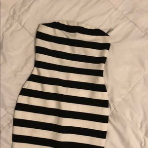 Fitted striped black and white strapless dress.